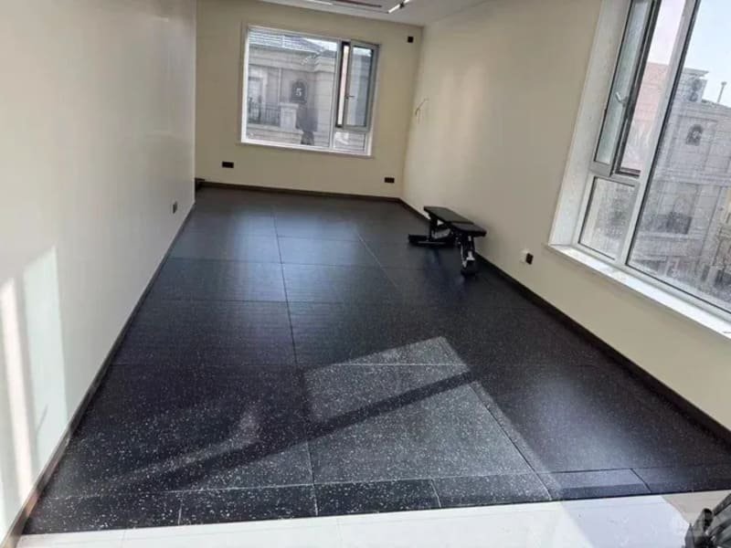 technician using a 3-meter straight edge to check floor levelness